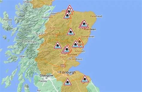 Heavy rain brings power cuts and flooding chaos with 29 red warnings ...