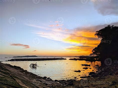 beautiful sunset silhouette on the beach 11972252 Stock Photo at Vecteezy