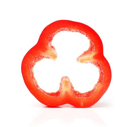 Premium Photo | Red pepper slices on white space