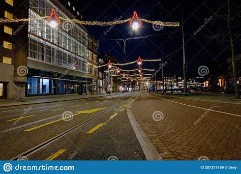 Christmas in Amsterdam at the Damrak at Night in the Netherlands Stock ...