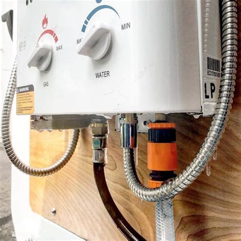 Step-by-step diagram for installing a 12V water heater in a campervan ...