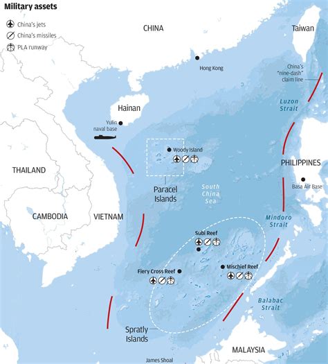 China is putting troops, weapons on South China Sea islands, and has ...