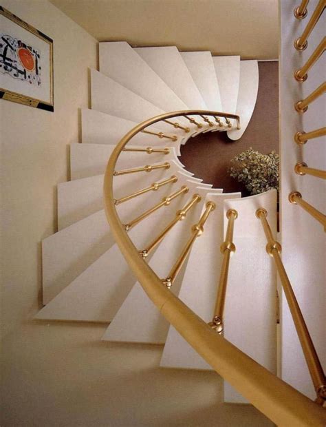 Gold spiral staircase railing - Home Decorating Trends - Homedit