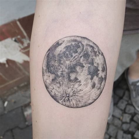 Realistic full moon tattoo on the right forearm by Jak Tattoos Crow ...