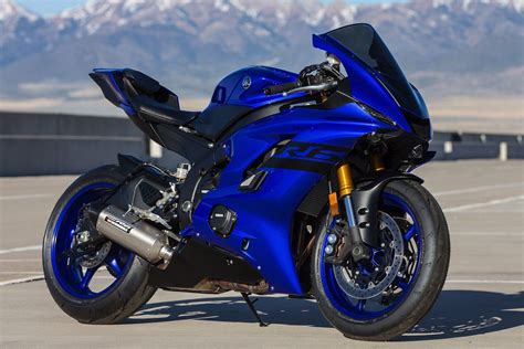 Blue Yamaha R6 Motorcycle on Airport Tarmac