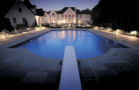 The landscape and pool area lighting make this mesmerizing. | Outdoor ...