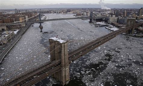 Hudson River freezes as Manhattan is encased in worst ice for a decade ...