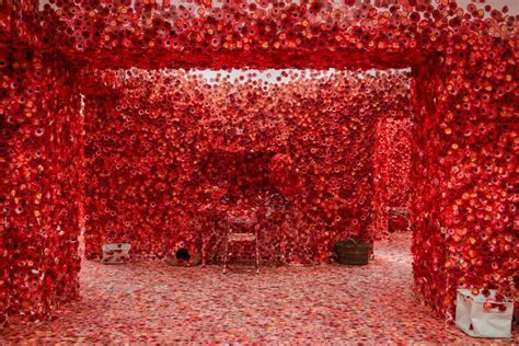 Yayoi Kusama Flower Obsession Looks Like an Explosion of Red Flowers