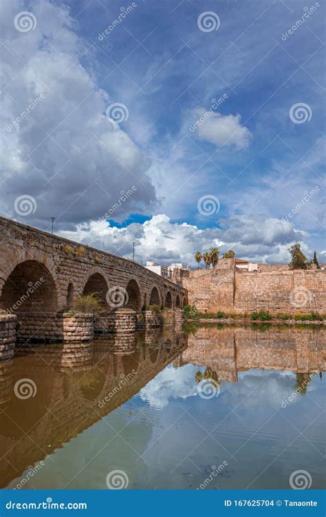 View of the Roman Bridge of Merida with Its Reflection on the Guadiana ...