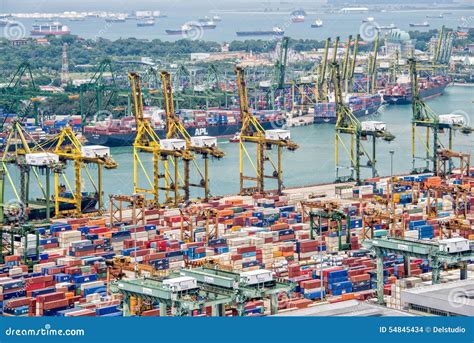 The Port Of Singapore Authority (PSA) Manages Busy Cargo Container ...