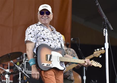 Jimmy Buffett postpones tour dates for the rest of the year, citing ...