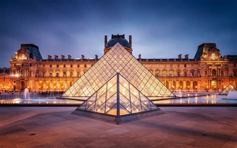 666 panes of glass, and the actual controversy of the Louvre Pyramid ...