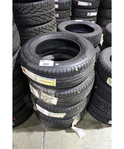 SET OF 4 MICHELIN 215/65R16 98H TIRES