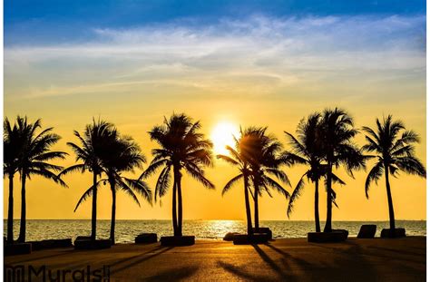 Fantastic tropical beach with palms at sunset Wall Mural