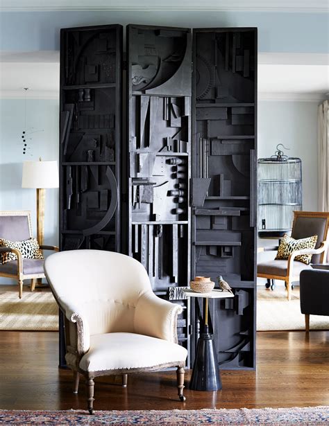 Create a stylish decorating a room divider with these innovative ideas