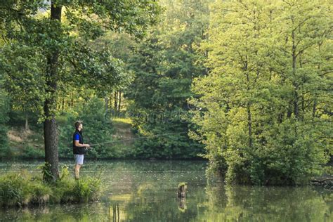 Man Fishing in Beautiful Nature Stock Photo - Image of hobby, outdoor ...