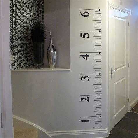 tape measure growth chart wall sticker by nutmeg | notonthehighstreet.com