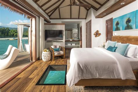 Sandals Resorts’ Over-The-Water Bungalows Are The Ultimate Luxury