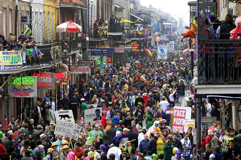 Crowds flood Bourbon Street on Mardi Gras Day in New Orleans