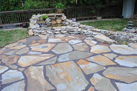 Flagstone Patio Cost | Patio stones, Backyard patio designs, Patio