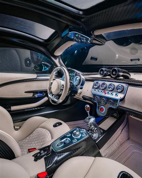 the interior of a sports car with leather and chrome trims, including ...