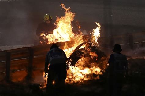 In photos: F1 driver Grosjean makes miraculous escape from fiery crash ...