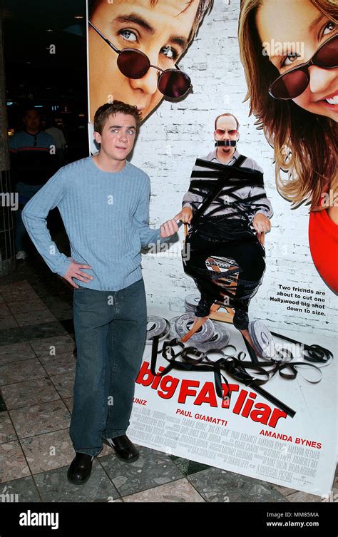 Frankie Muniz posing at the premiere of Big Fat Liar at the Universal ...