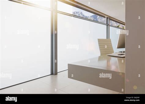 Modern desk in home office Stock Photo - Alamy