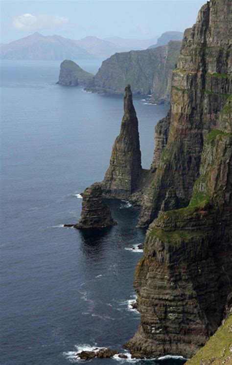 Shear coastal cliffs of the Faroe Islands | Faroe islands travel ...