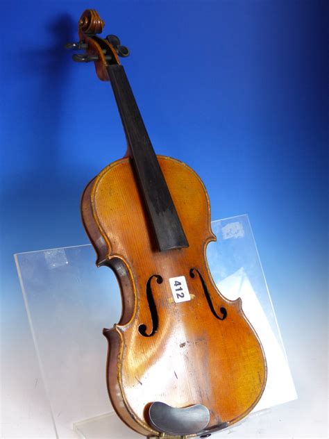 AN ANTIQUE VIOLIN WITH TWO PIECE MAPLE BACK, LENGTH OF BACK 37cms ...