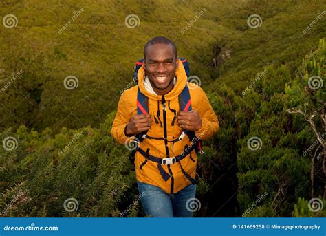 Happy Young Black Man Hiking in Nature with Backpack Stock Photo ...