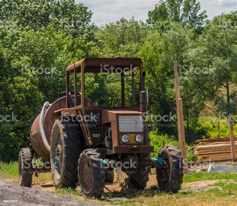 Very Old Tractor In Field Different Parts Stock Photo - Download Image ...