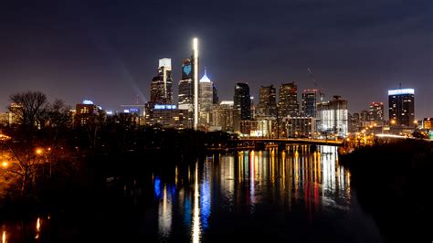 Philly Skyline Shines Blue for COVID-19 Anniversary - Visit Philadelphia