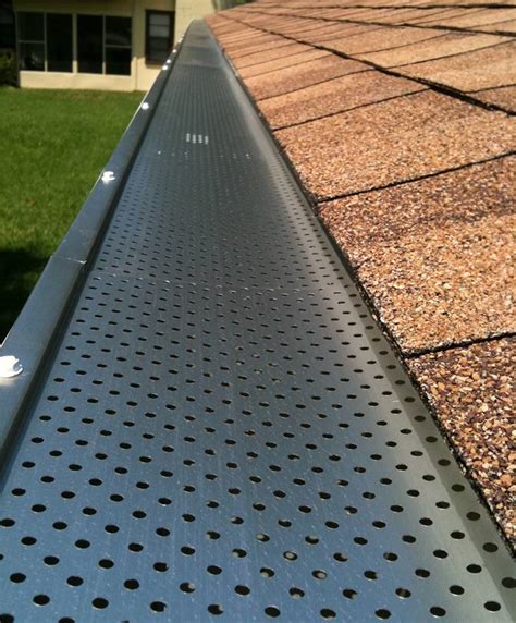 Perforated Metal Leaf Guards Keep Your Gutters Clean