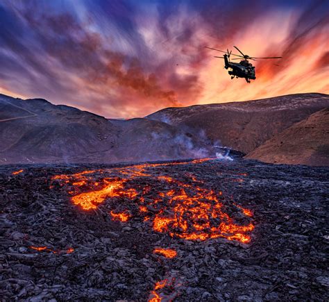 Helicopter hovering over the Fagradalsfjall volcano