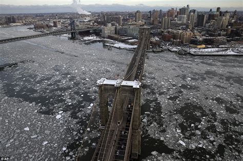 Hudson River freezes as Manhattan is encased in worst ice for a decade ...