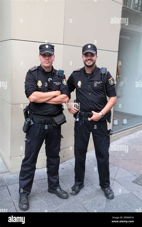 Two National Police Force Police officers (Policia Cuerpo Nacional de ...