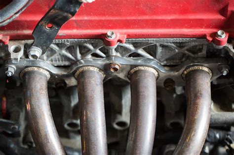 How to Tell if Your Exhaust Manifold is Leaking - In The Garage with ...