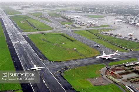 An aerial view runways and aircrafts at the Mumbai's Chhatrapati ...