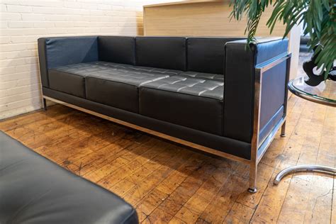 Mid-Century Modern Black Leather Sofa • Peartree Office Furniture