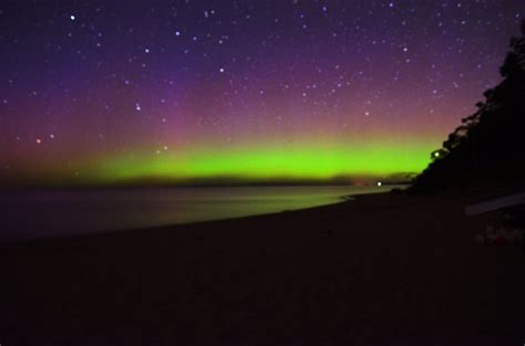 Northern lights aka aurora borealis on Lake Michigan at orchard beach ...