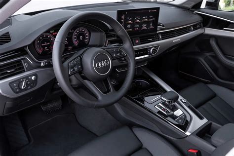 The interior of the latest 2020 Audi A4 - Changing Lanes