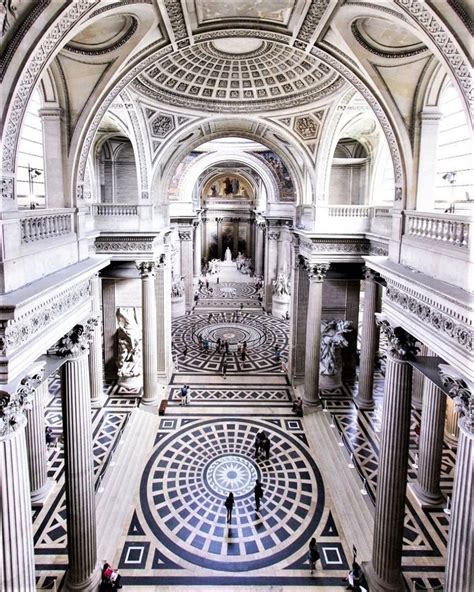 the inside of a large building with many columns