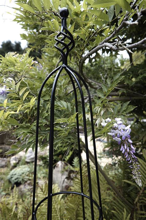 Garden Plant Support Tunnels Metal - 'peace' polished metal plant ...