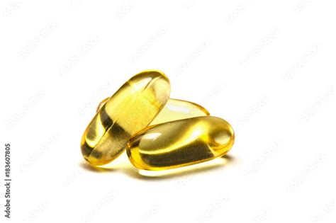 Isolated fish oil capsules Stock Photo | Adobe Stock