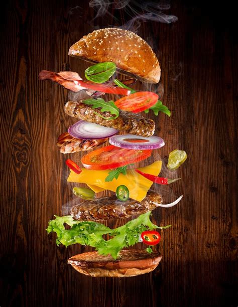 Big Tasty Burger with Flying Ingredients. Stock Photo - Image of meal ...