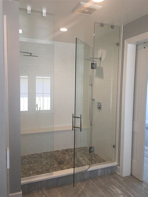 Frameless Glass Shower Enclosures: Channel vs. Clips