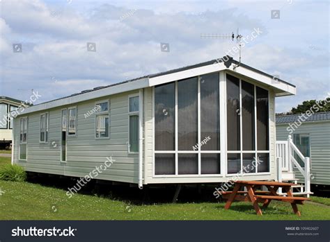 Exterior Of Modern Caravan, Trailer Or Mobile Home In Park - Generic ...