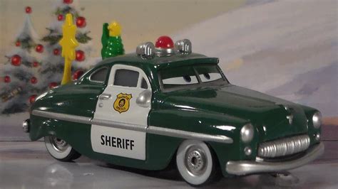 HOLIDAY SPIRIT SHERIFF, 2009 WORLD OF CARS MATTEL MATER SAVES CHRISTMAS ...