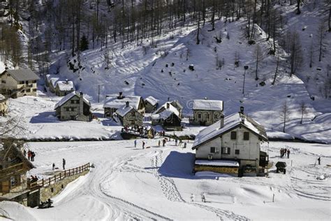 Mountain Village Nestled in the Snow, Stock Image - Image of alps ...